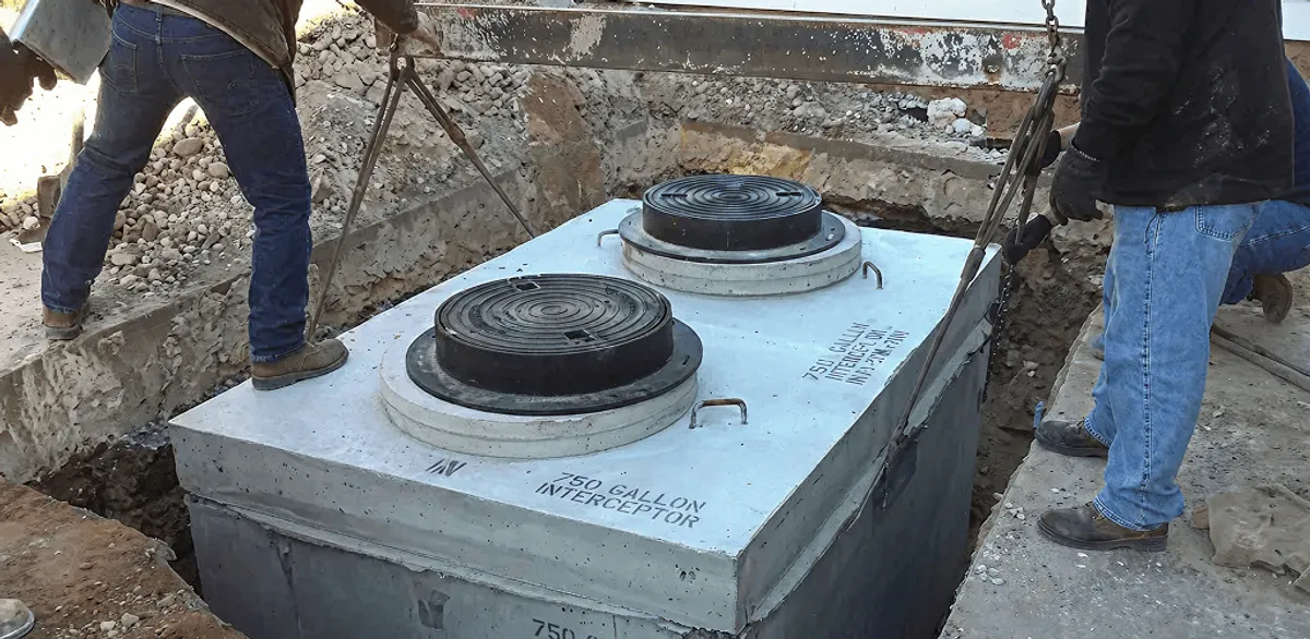 Grease trap installation for a commercial property drainage system in Aurora, IL