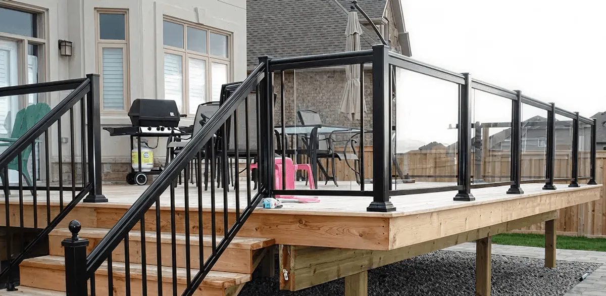 Handrail installation on a deck staircase for safety and code compliance in Aurora, IL